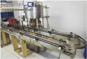 Envasadora rotativa com 12 bicos � vacuo Wada